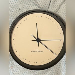 Designer wall clock. Designed by Henning Koppel